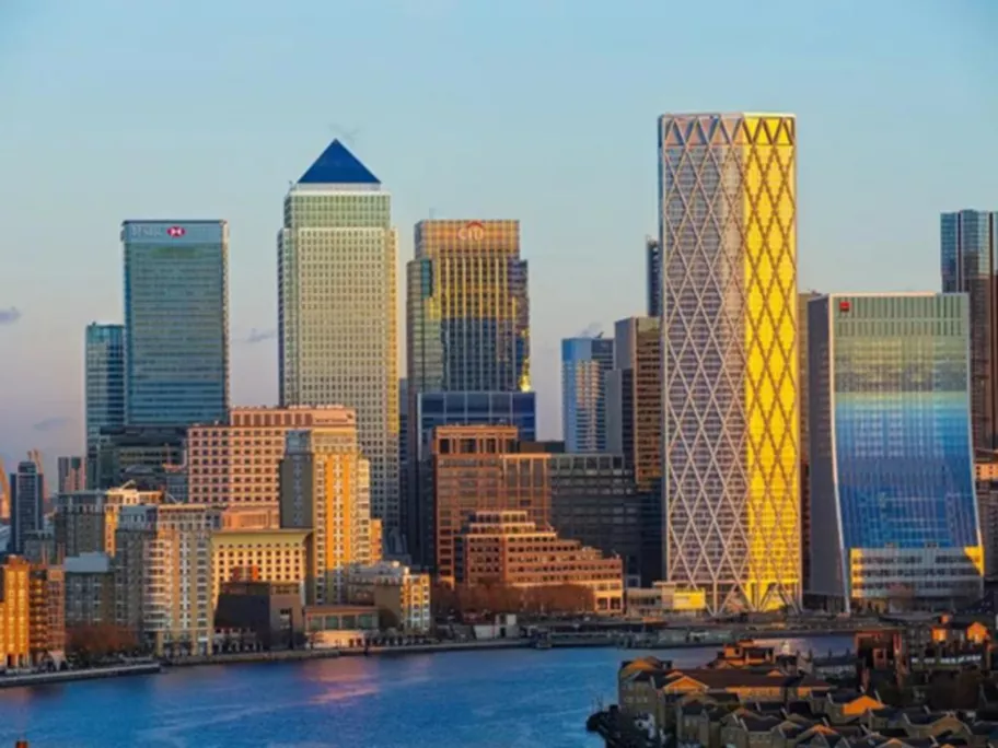 Panoramic view of Canary Wharf - London at sunset.